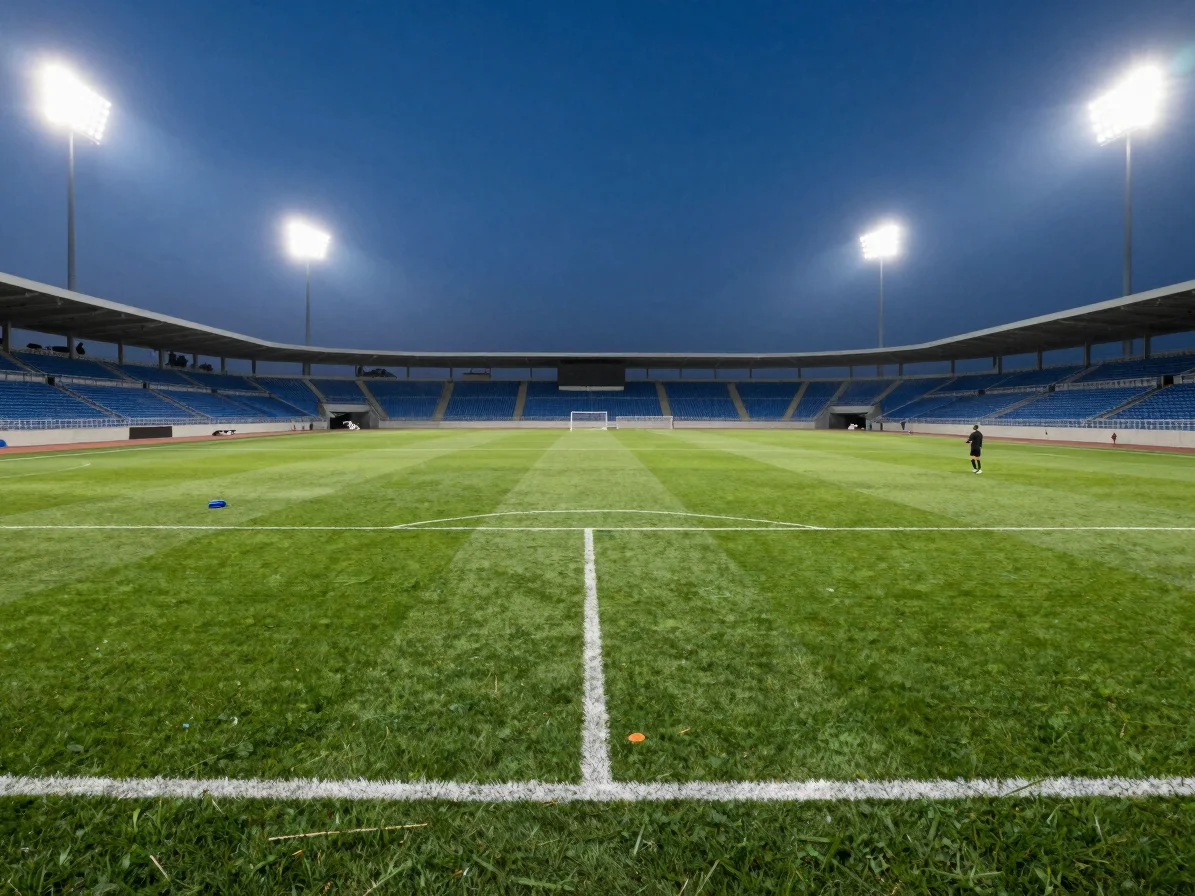 Illuminated outdoor turf field for soccer and athletic conditioning under bright stadium lights